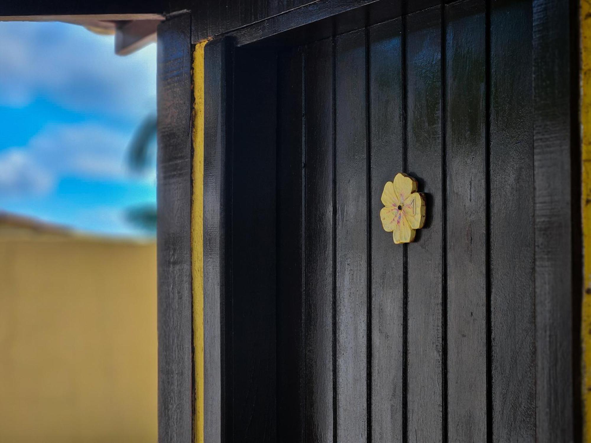 Hotel Bella Vista Ocean View Búzios Exteriér fotografie A golden flower-shaped knob on a door