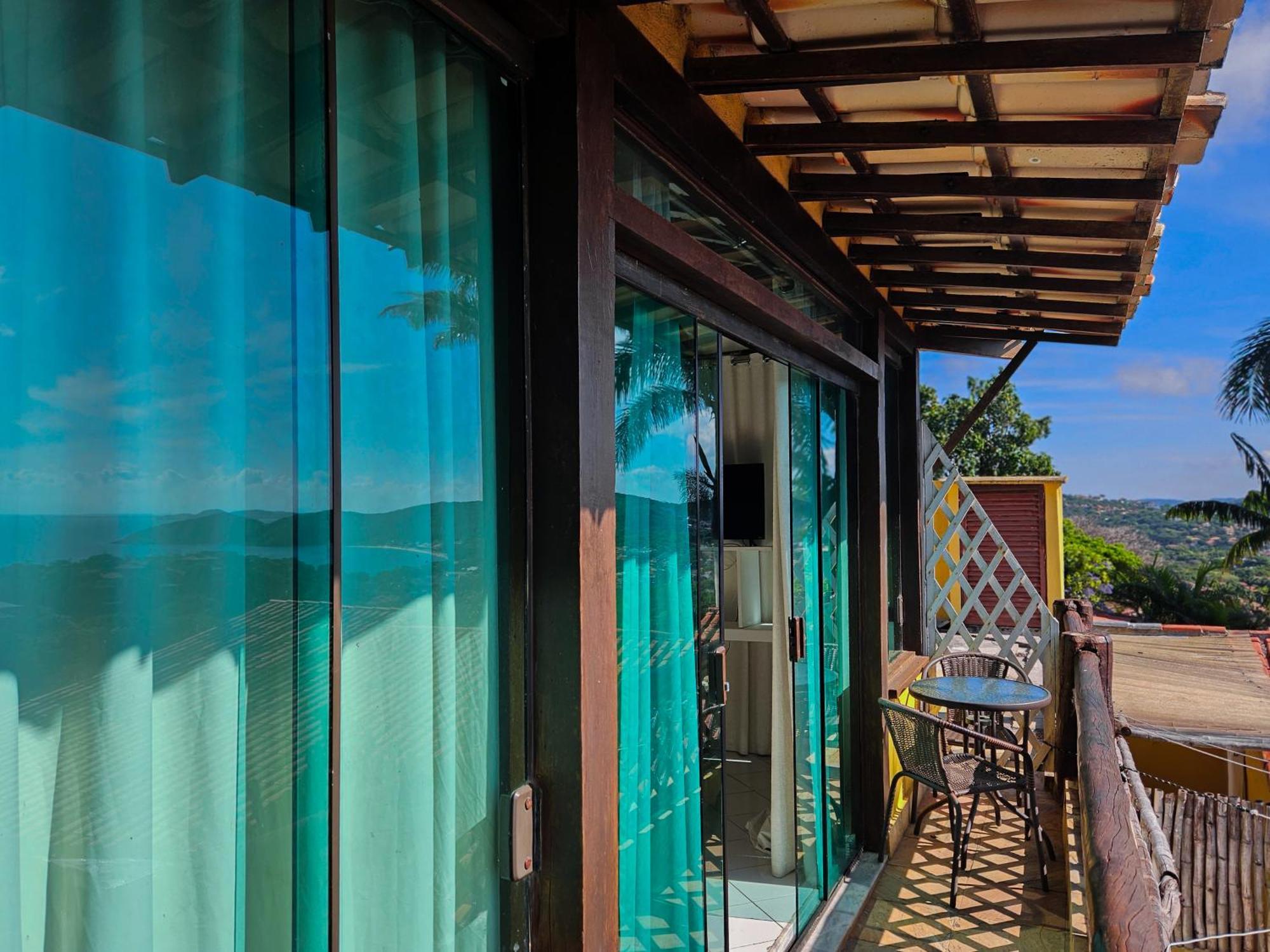 Hotel Bella Vista Ocean View Búzios Exteriér fotografie A glass house in the Philippines